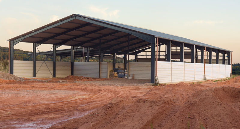 Commercial Metal building with windows and large garage door