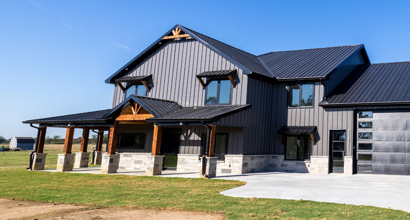 large barndominium with a 2 car garage