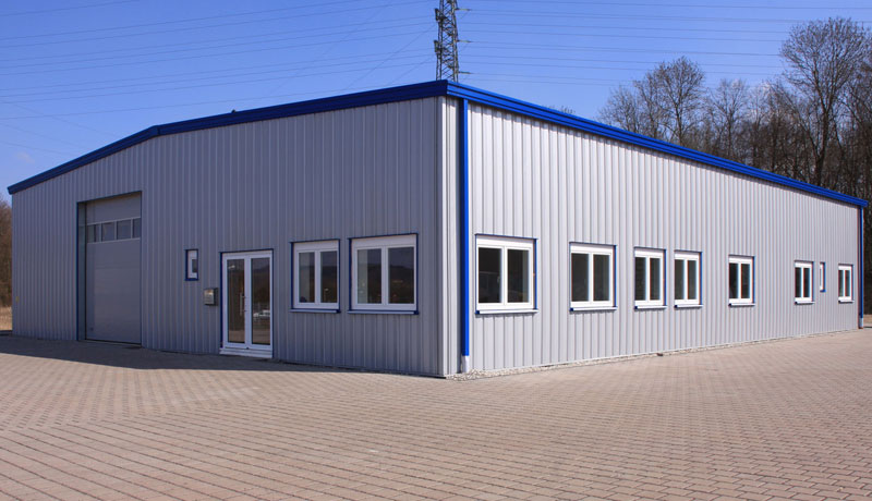 Commercial Metal building with windows and large garage door